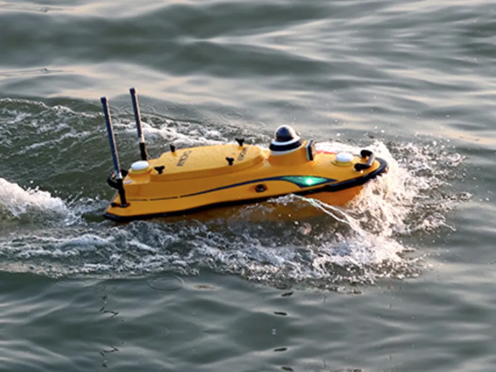 Remote controlled survey boat on the water